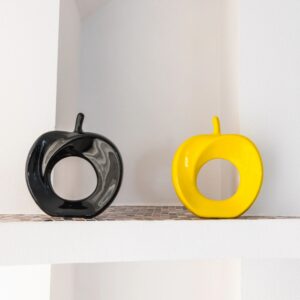 Black and yellow ceramic Apple