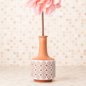 Dahlia and clay vase