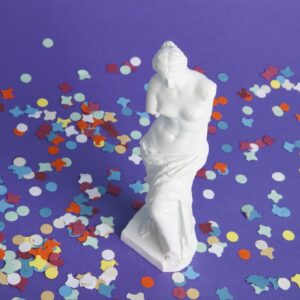 Milo's venus surrounded by confetti