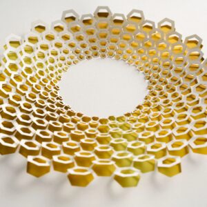 Spiral Honeycomb Paper Cutout Artwork with Golden Yellow Depth and Symmetry